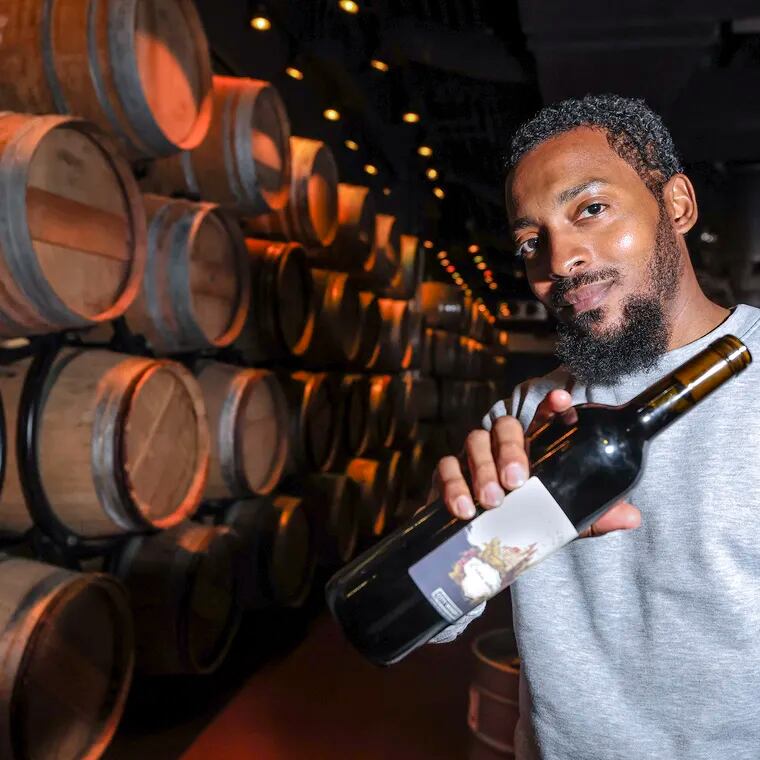Chill Moody poses for a portrait with his new wine at City Winery Philadelphia on Thursday, March 21, 2024. The new wine will debut on Saturday.