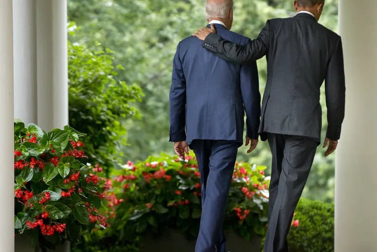 President Obama and Vice President Joe Biden, after the Supreme Court's ACA ruling. (Associated Press)