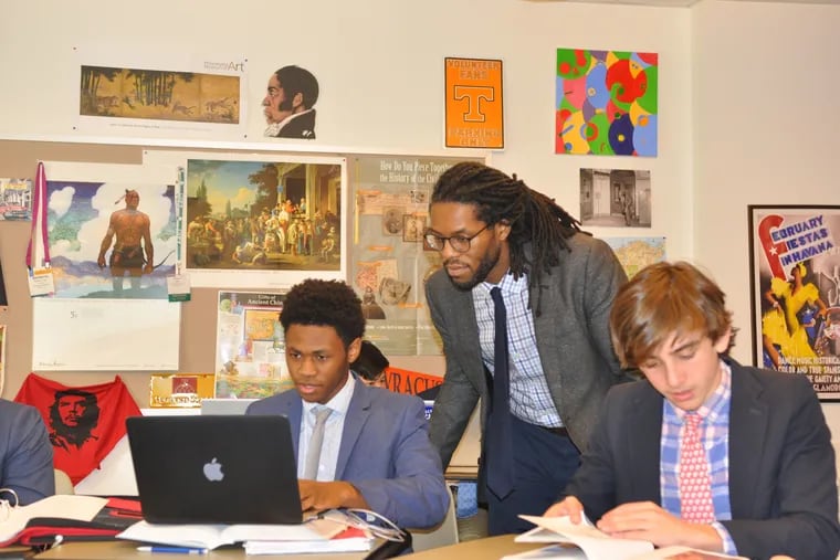 Brendon Jobs, director of diversity and inclusion at the Haverford School, working with students.