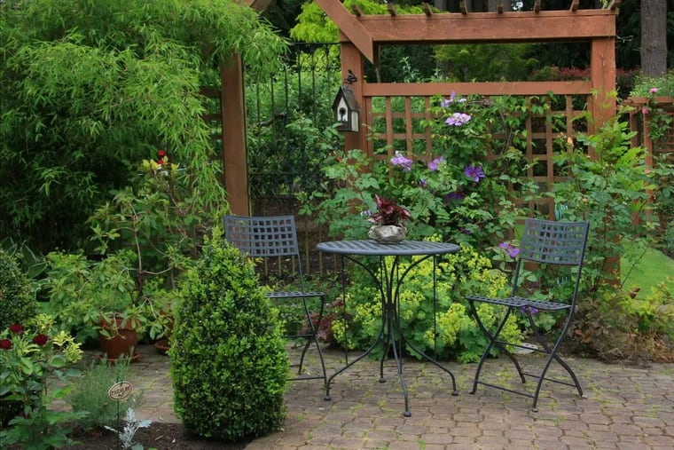 A backyard living space doesn't have to be huge to be inviting.