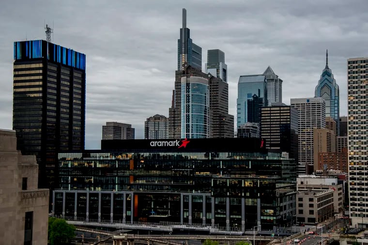Aramark Global Headquarters (front) at 2400 Market St. and the skyline of Center City Philadelphia April 29, 2019. Includes the Comcast Technology Center, Comcast Center, PECO building and Liberty Place.