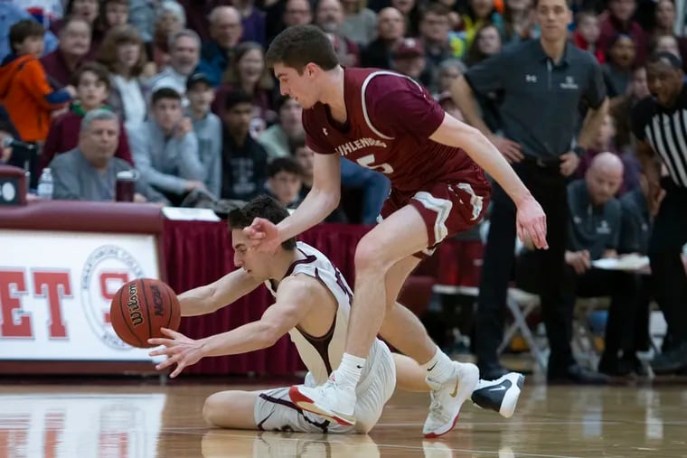 Swarthmore's Vinny DeAngelo, left, goes after a loose ball during a Centennial Conference semifinal game.