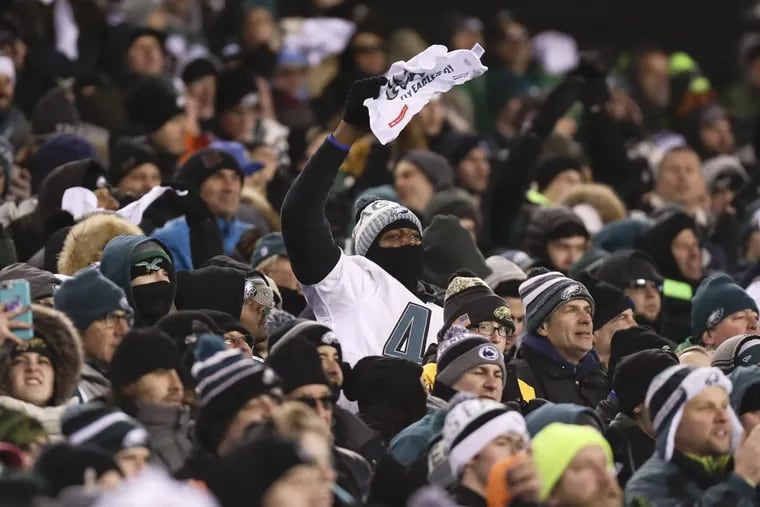 A Eagles fan waves his towel against the Atlanta Falcons in the NFC Divisional Playoff game on Jan. 13.