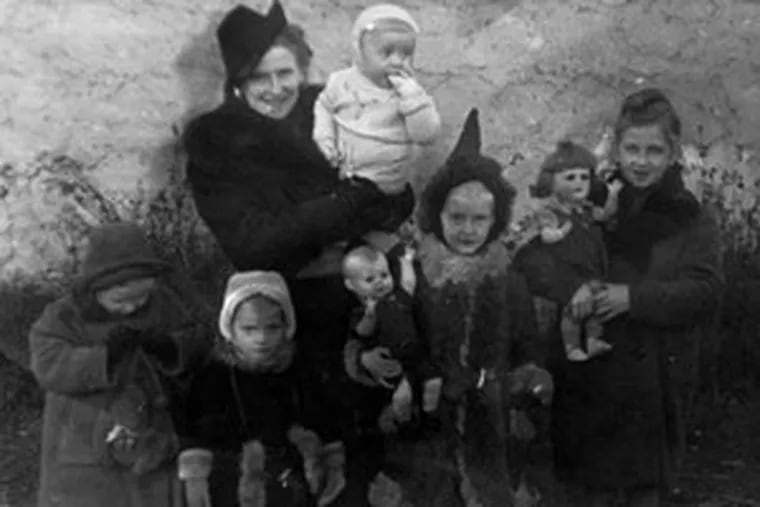 This copy of an undated family photo shows Alodia Witaszek (far left) and Daria Witaszek (secondfrom left) with their mother, Halina, and three siblings in 1943, months after their father&#0039;s arrest.