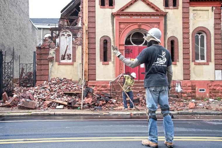 Demolition work at the Christian Street Baptist Church in Bella Vista, July, 2018.