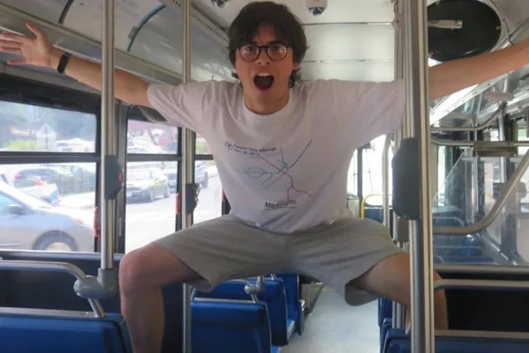 Miles Taylor, 19, seen here on an MBTA bus in Boston, is trying to ride every route SEPTA offers before he graduates from college.