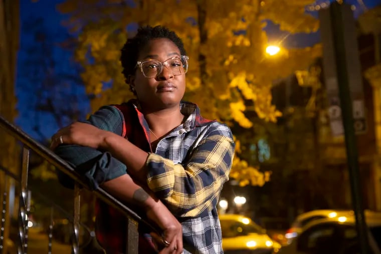 Nicole Jones, a bartender, suffers from less hours and not seeing customers during the pandemic. She is shown in her neighborhood on Nov. 17, 2020.  Nicole said, “The good news is when now know what to expect from the pandemic. The bad news is that we know what to expect.”