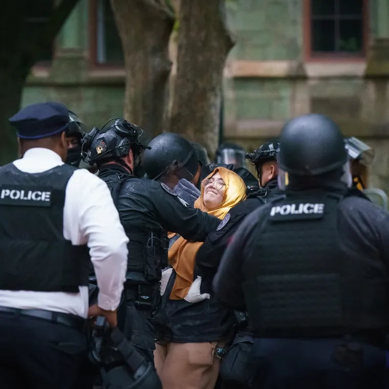 Police arrest a protester on the University of Pennsylvania campus.