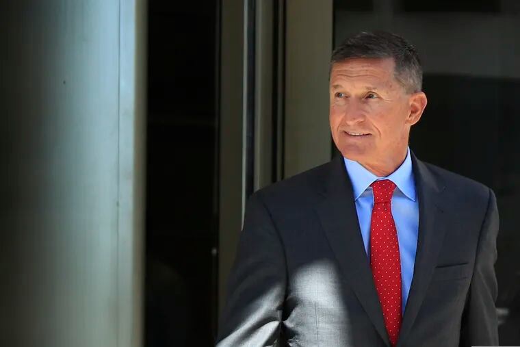 FILE - In this July 10, 2018, file photo, former Trump national security adviser Michael Flynn leaves the federal courthouse in Washington, following a status hearing. Michael Flynn may have given extraordinary cooperation to prosecutors, but the run-up to his sentencing hearing has exposed tensions over an FBI interview in which the former national security adviser lied about his Russian contacts. (AP Photo/Manuel Balce Ceneta, File)