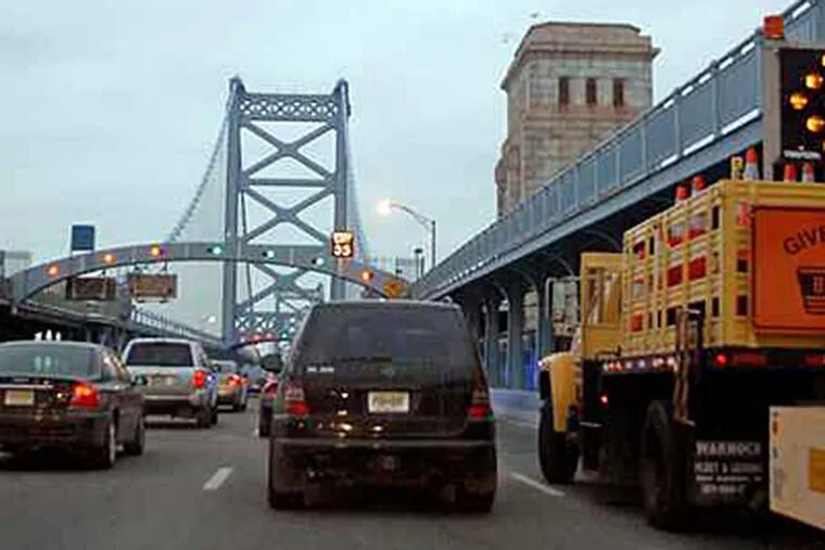 Tolls on the Benjamin Franklin, Walt Whitman, Commodore Barry, and Betsy Ross bridges were raised last year to pay off DRPA bonds that will be issued soon. They are scheduled to be raised again - to $5 - in September. (Tom Gralish / Staff Photographer