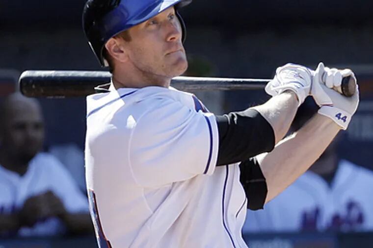 New York Mets' Jason Bay hits a three-run home run during a spring training game. (AP Photo/Richard Drew)