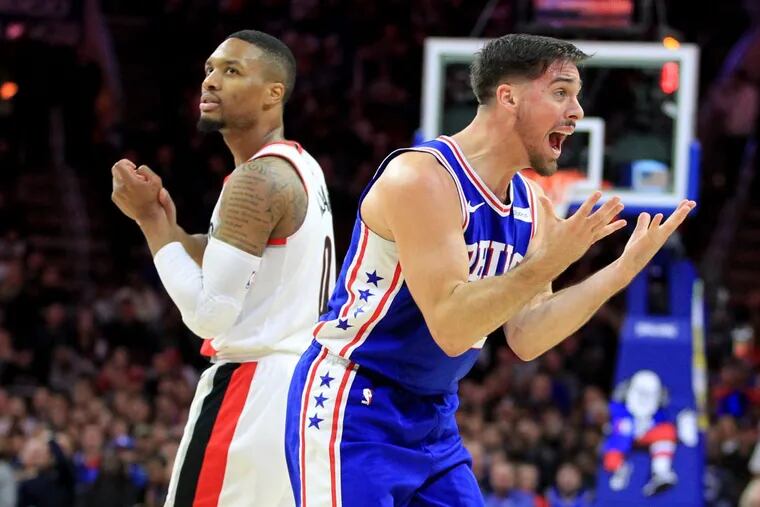The Sixers’ T.J. McConnell, right, reacting after being called for a foul against Portland’s Damian Lillard during the teams’ meeting in November.