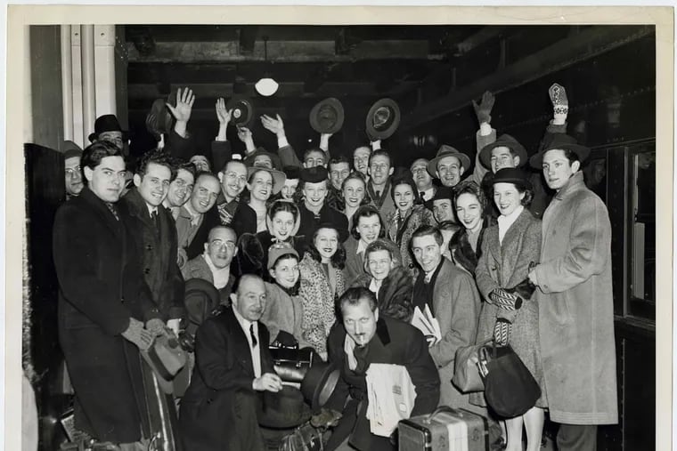 The pioneering Philadelphia Ballet waits for a train during its eight-week national tour in 1941.  Catherine Littlefield, the company's founder, choreographer, and lead ballerina, is second from right in the second row, wearing the fur coat.