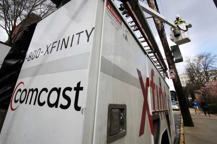A Comcast truck works in Pittsburgh.Users in and around Philadelphia reported widespread Xfinity outages Tuesday morning.