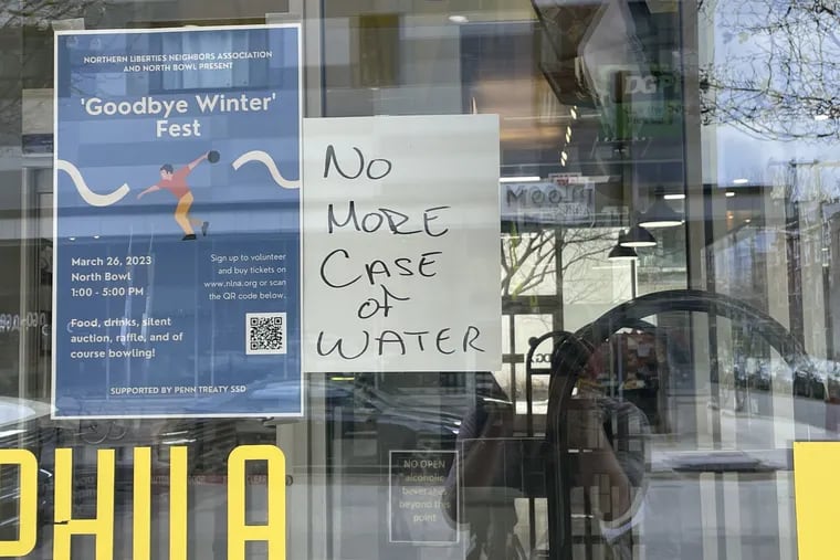 A sign posted at DGX on 2nd Street in Northern Liberties on Monday, March 27, 2023, warned that the store was sold out of water.
