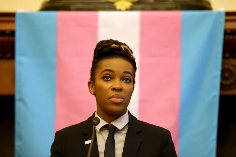 Amber Hikes, executive director of the Mayor's Office of LGBT Affairs for the City of Philadelphiaduring, pauses during a news conference at City Hall on June 25, 2019 in Philadelphia, PA. Philadelphia Police unveil a new policy for how to interact with people who identify as transgender or non-binary, with appearances by other city officials and members of the LGBTQ+ community.
