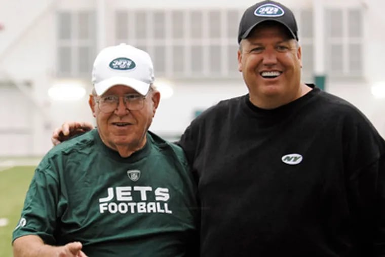Former Eagles coach Buddy Ryan, left, was diagnosed with cancer, according to his son Rex, right. (Bill Kostroun/AP file photo)