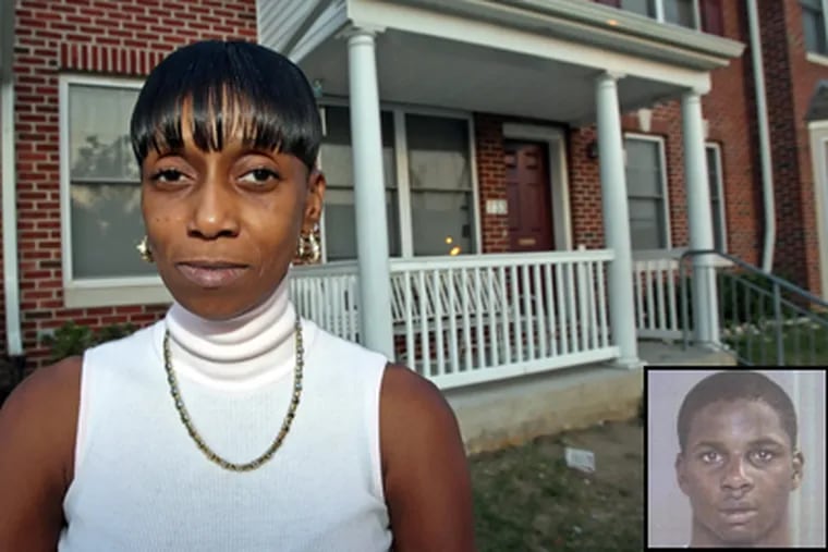 Neighbor Barbara George says suspect Andre Butler (inset), who lived in the house over her shoulder, was 'a menace to the  neighborhood.' (Steven M. Falk / Daily News)