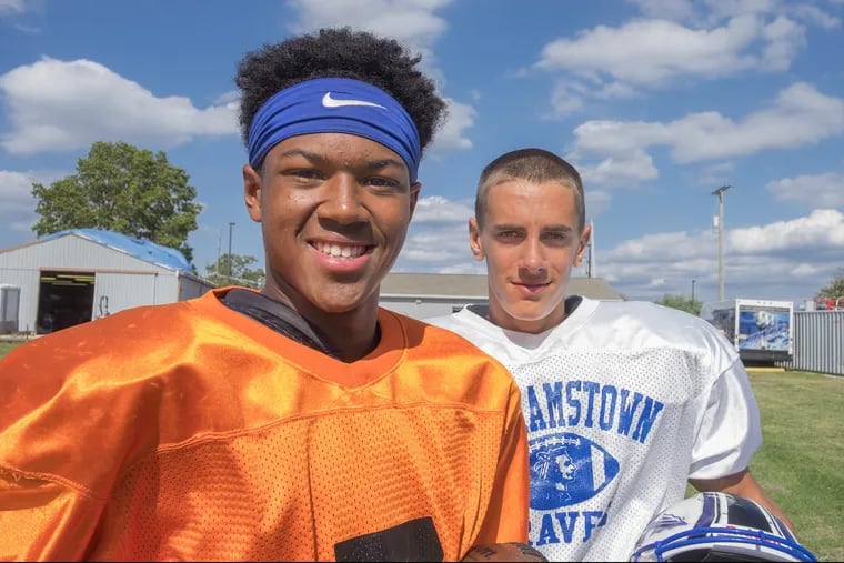 Williamstown quarterback J.C. Collins (left) and wide receiver Vic Ruggiano in 2016.
