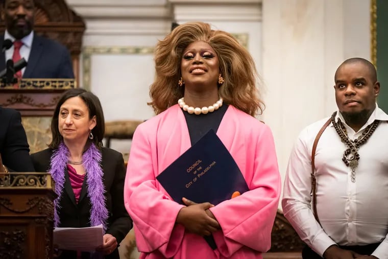 (Left to Right) Philadelphia City Councilperson Rue Landau, Philly drag queen Sapphira Cristál, Tyrell Brown, the Executive Director of Galaei, at a city council resolution ceremony honoring her, in Philadelphia, Thursday, April 18.