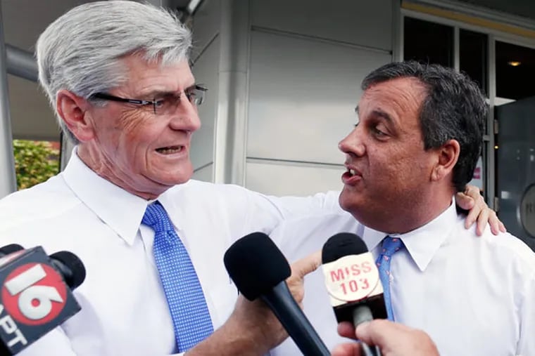 Gov. Christie joking with Mississippi Gov. Phil Bryant while on a tour through Mississippi and Louisiana this month to raise money for fellow Republicans. (ROGELIO V. SOLIS / AP)