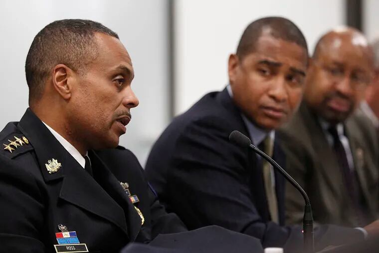 Deputy Police Commisioner Richard Ross, left, speaks about the Philadelphia Police Deptmartment, while U.S. Attorney Zane Memeger, center, and Philadelphia Mayor Michael Nutter, right, give Ross their full attention on April 20, 2015. ( Michael Bryant / Staff Photographer )