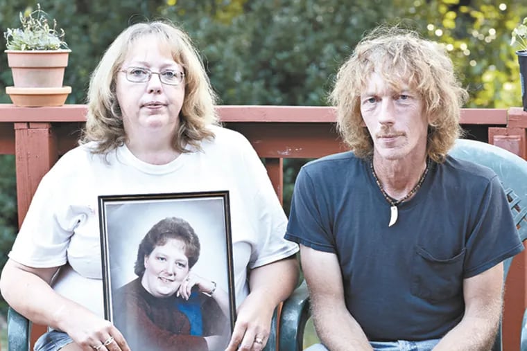 Theresa Hunt's sister, Martha Trinca, and brother, Evan Hunt, at Martha's home in Mechanicsville, Va.  (Sarah Walor for The Philadelphia Inquirer)