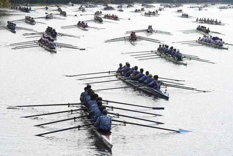 Boys varsity eight shells await their turn to row in the 2016 Head of the Schuylkill Regatta.