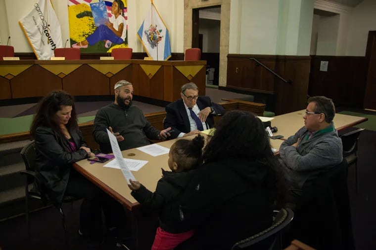 The family of Troy Anderson and council person Angel Fuentes pictured at Camden city hall on Thursday March 21, 2019. The group discussed possible solutions to Fuentes' ordinance to regulate makeshift memorials.