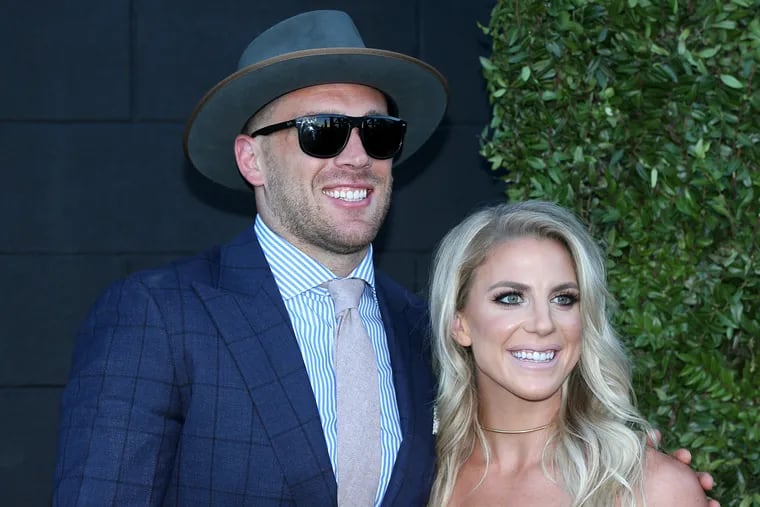 Zach Ertz and Julie Ertz pose for photos while entering the Eagles' Super Bowl championship ring ceremony in South Philadelphia last year.