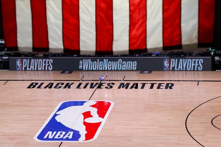 An empty court and bench are shown following the scheduled start time of Game 5 of an NBA basketball first-round playoff series Wednesday.
