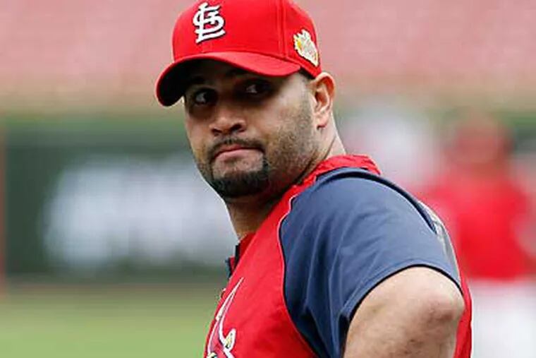 The Miami Marlins have reportedly made a 10-year offer to free-agent slugger Albert Pujols. (Eric Gay/AP)