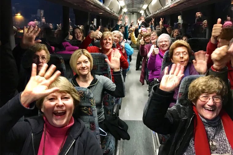 Camden women fill a bus headed to Washington D.C. Saturday morning, to take part in a planned Women's March on Washington.
