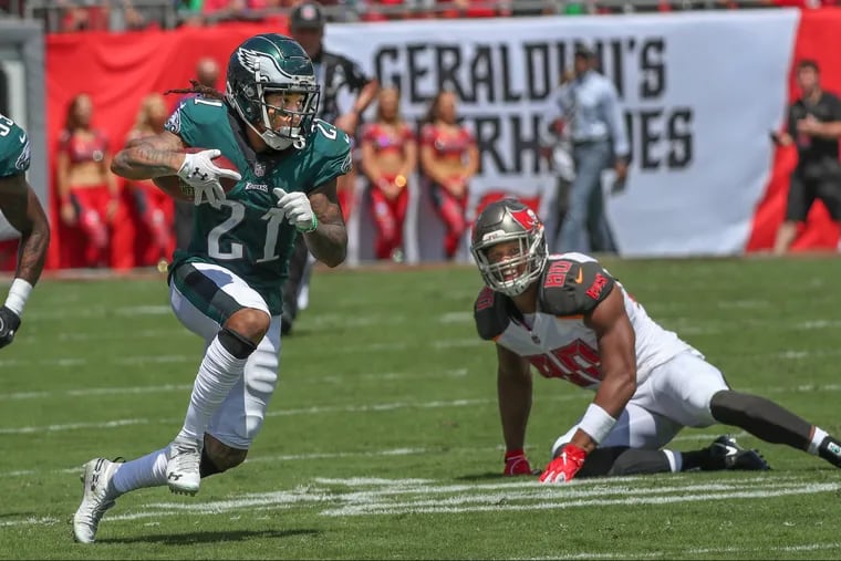 Eagles cornerback Ronald Darby runs back an interception against the Buccaneers.