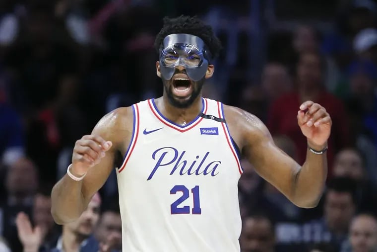 Sixers center Joel Embiid reacting after a foul call against the Celtics during Game 3.