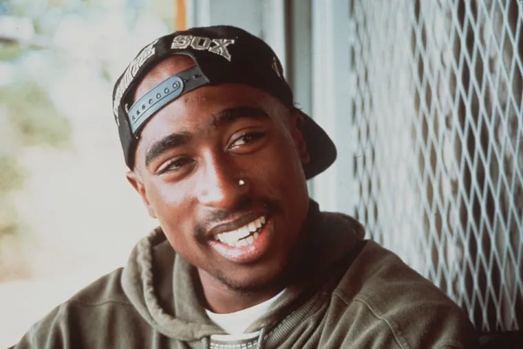 Rap musician Tupac Shakur is shown in this 1993 handout photo. Shakur's famous THUG LIFE tattoo was part of a movement to reclaim the word "thug."
