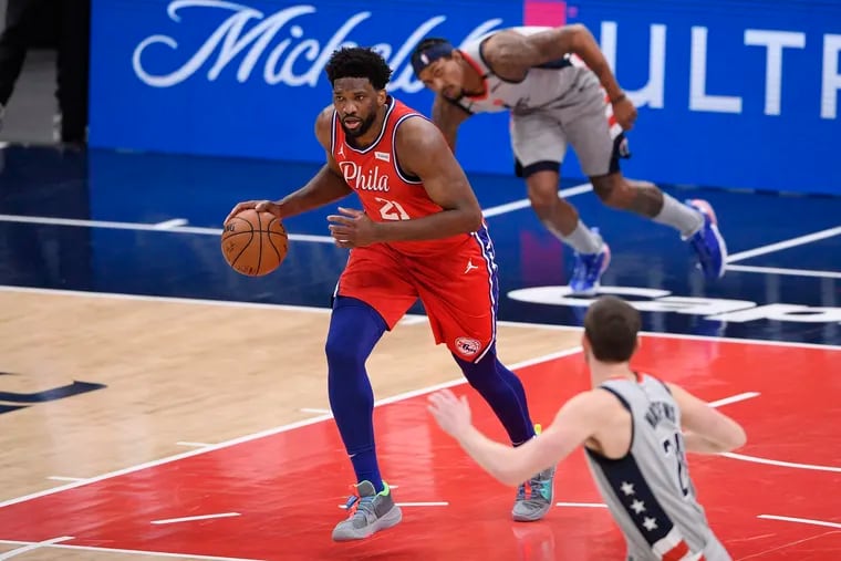Joel Embiid had 23 points before suffering a deep bone bruise in his left knee in the third quarter Friday night against the Washington Wizards.
