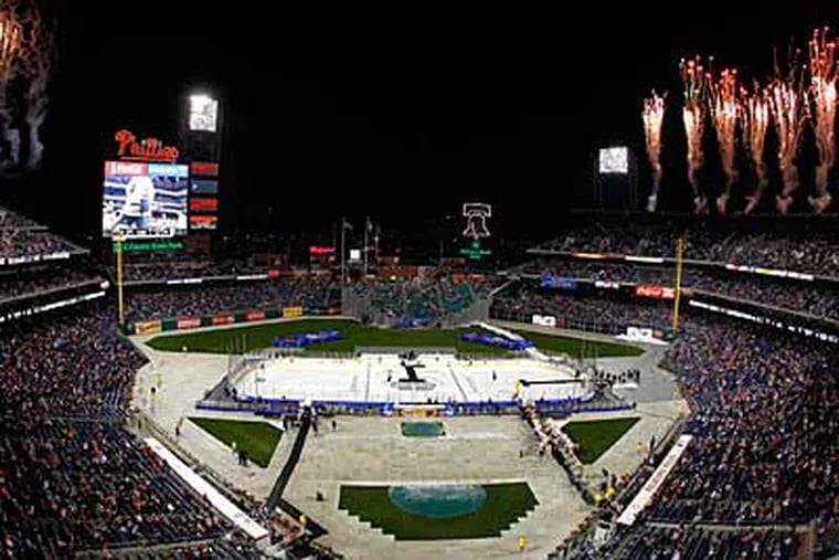 Fireworks explode over Citizens Bank Park as the Hershey Bears and Adirondack Phantoms take to the ice. (Tom Mihalek/AP)