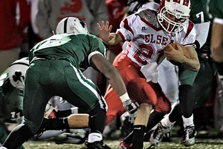 Delsea's Dylan Wilton braces for impact from Camden Catholic's Ryan
Graves in a 17-14 Delsea win. (David M Warren / Staff Photographer)