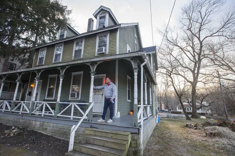 Tim Meise on the porch of one of the two sober-living houses he opened in Medford, N.J., in 2018. Members of a nearby church recently brought dinner to the seven men who live there.