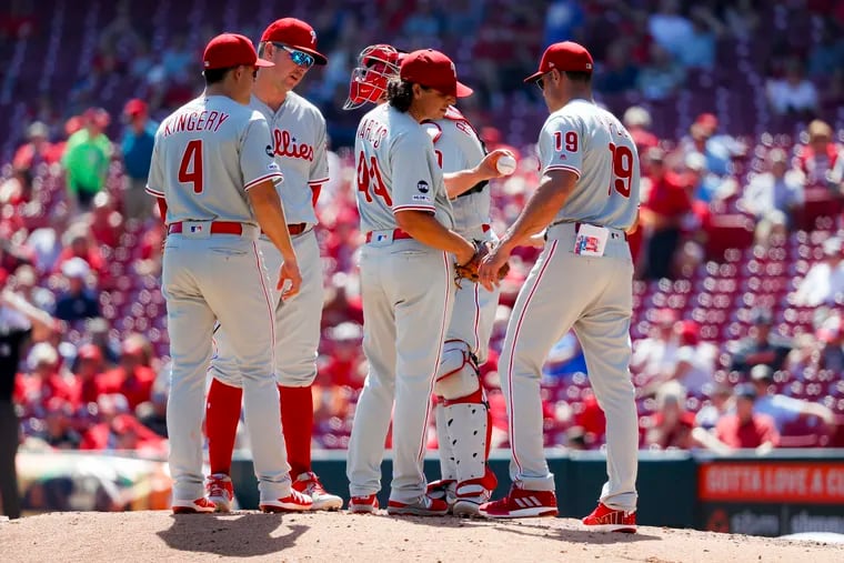Phillies starting pitcher Jason Vargas (44) is relieved by manager Gabe Kapler (19) in the sixth inning Thursday.
