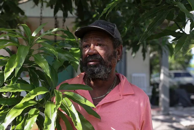 Robert Simpson, a Pahokee resident charged with voter fraud, outside of his home on Tuesday, Aug. 30, 2022, in Pahokee, Florida.
