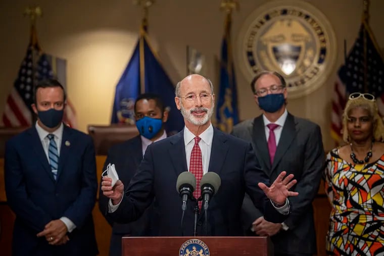 Pennsylvania Gov. Tom Wolf speaks about voting rights in Delaware County in June. He said at the time that new voter ID rules were a nonstarter for him, but now he says he's open to some changes.