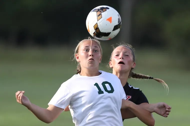 Mackenzie Clement, left, of Clearview and Chloe Lang of Kingsway Regional go up to head the ball during a girls soccer game at Kingsway on Sept. 5, 2018. Clearview won 4-2.