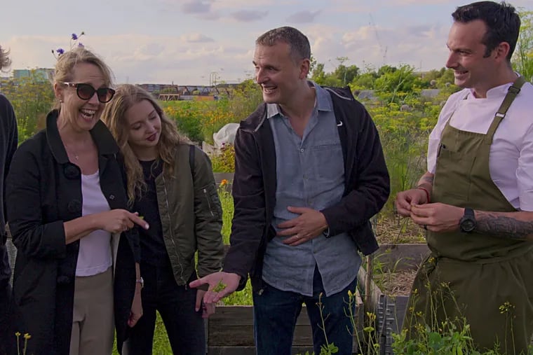 Monica Horan Rosenthal (second from left) and her husband, Phil Rosenthal (second from right), with their children Ben (far left) and Lily and Copenhagen chef Matt Orlando in a scene from Netflix's "Somebody Feed Phil," in which the "Everybody Loves Raymond" creator travels the world in search of great meals.