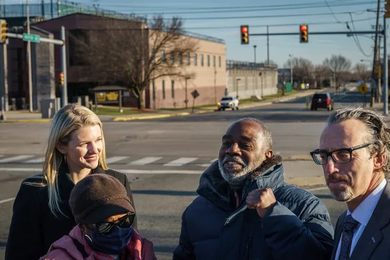 Willie Stokes, center, speaks with the media outside SCI Chester, after being released from prison, January 4, 2022. Stokes lawyer Michael Diamondstein, far right, and his sister Renee Stokes, second from left.