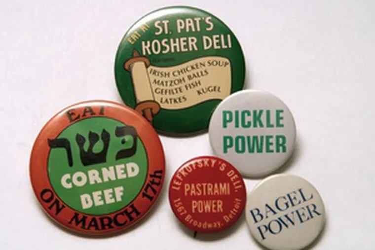 You can wear your culinary loyalties on your lapel with any of the buttons that are part of the Americana show.