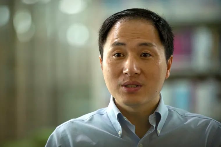 In this Oct. 10, 2018, photo, scientist He Jiankui speaks during an interview in Shenzhen in southern China's Guandong province. China's government on Thursday, Nov. 29, 2018, ordered a halt to work by a medical team that claimed to have helped make the world's first gene-edited babies. (AP Photo/Mark Schiefelbein)
