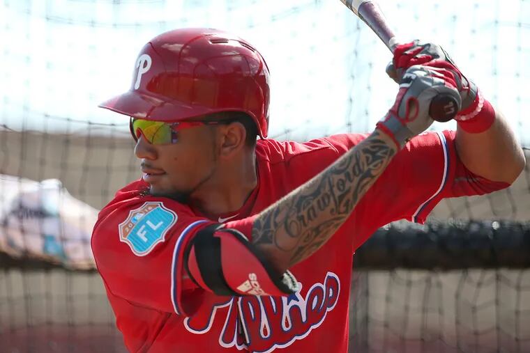 The Phillies' J.P. Crawford takes his turn at batting practice during Phillies spring training.