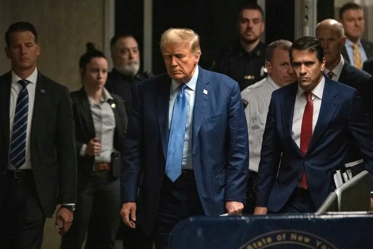 Former president Donald Trump arrives for his trial at Manhattan Criminal Court on Thursday, May 9, 2024.